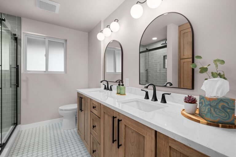 Bathroom remodel, double vanity with wood cabinetry and quartz counter