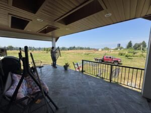 Covered and screened patio, stained wood ceiling and recessed lighting